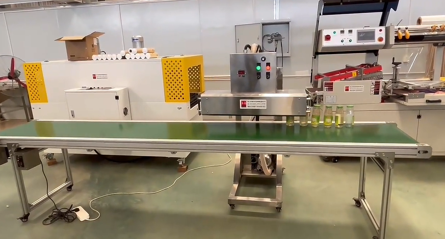 Máy co màng cổ chai, nắp chai tốc độ cao tích hợp dây chuyền sản xuất Máy co màng cổ chai, nắp chai tốc độ cao tích hợp dây chuyền sản xuất