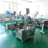 Máy dán nhãn chai tròn, vuông dạng lăn miết tự động
