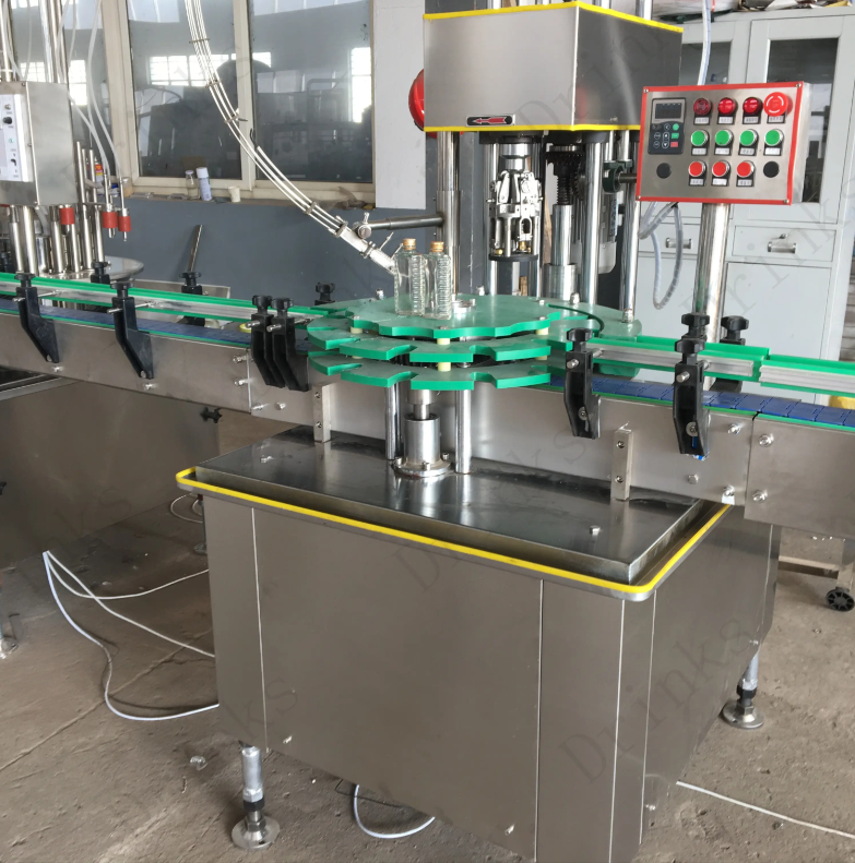Máy đóng nắp chai bia, chai thủy tinh tự động Máy đóng nắp chai bia, chai thủy tinh tự động