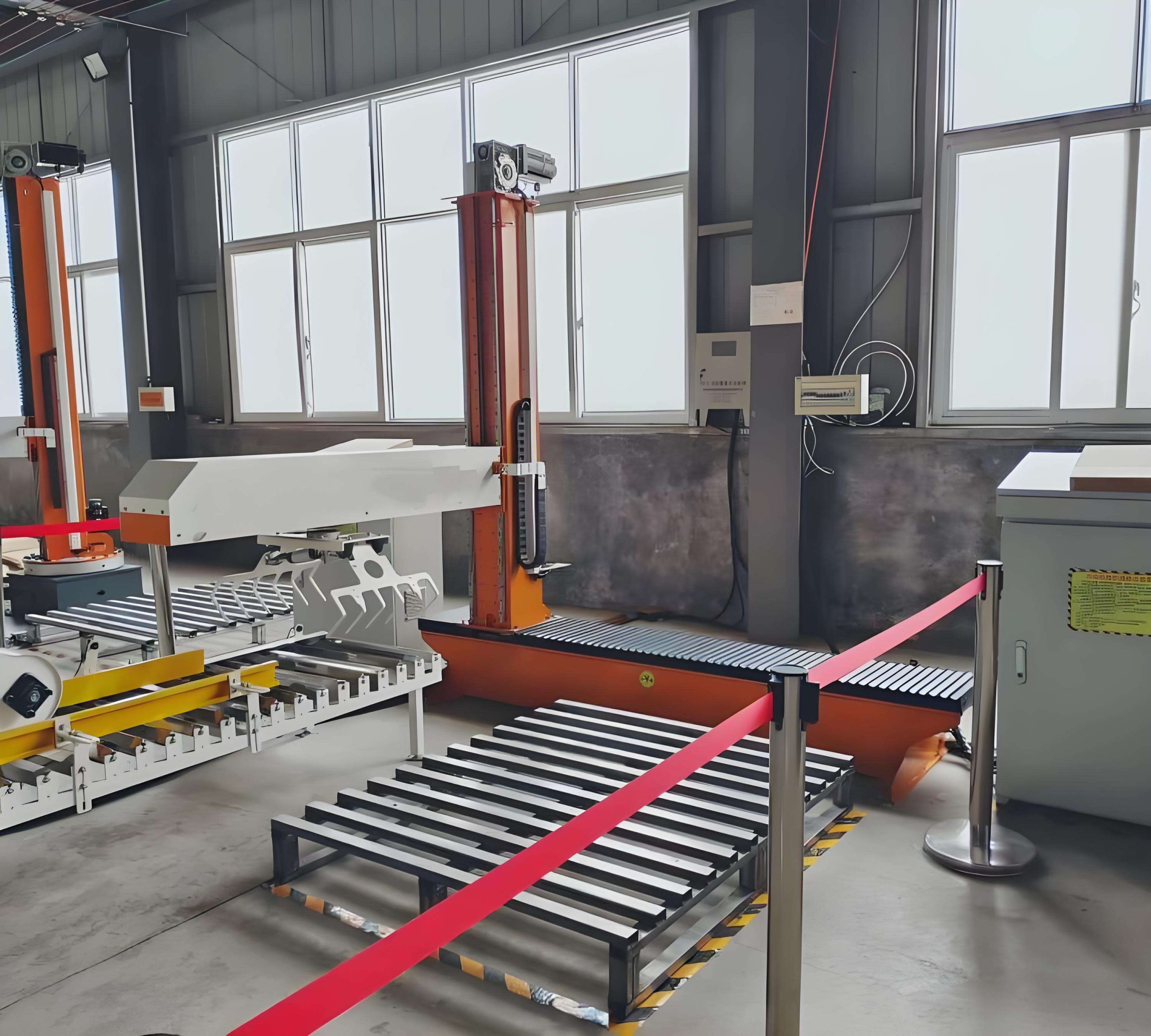 Máy xếp thùng sơn lên pallet tốc độ cao Máy xếp thùng sơn lên pallet tốc độ cao